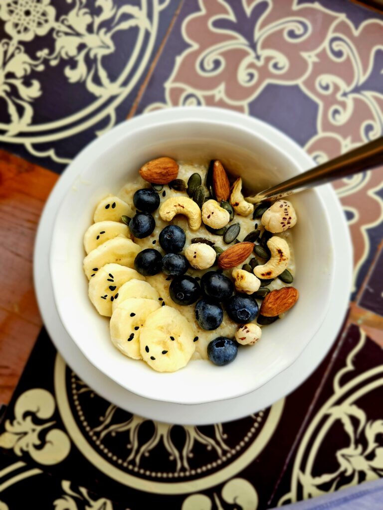 Classic oats porridge topped with nuts and fruits